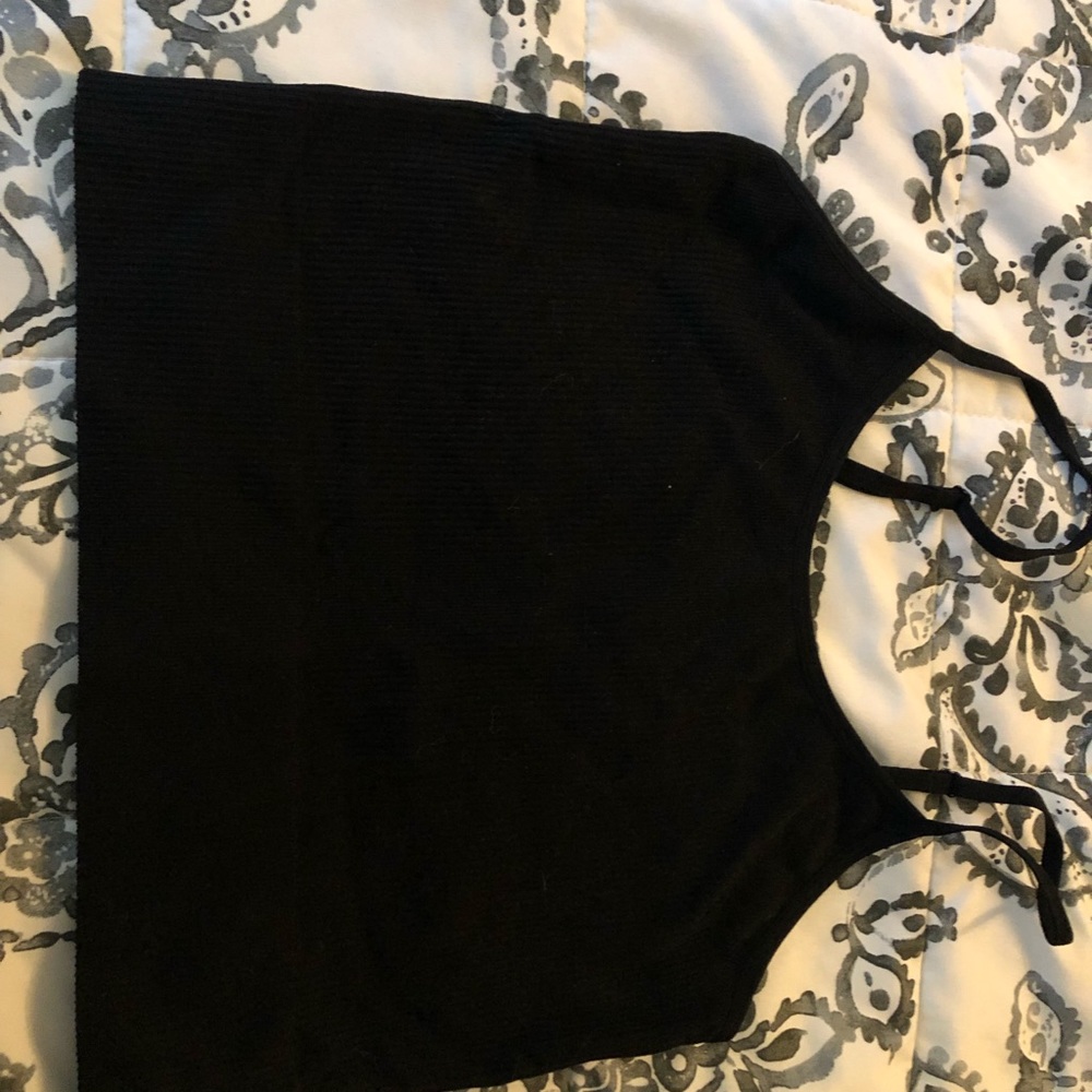 All black crop top so cute. The size is M/L.